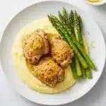 Garlic Parmesan Chicken Thighs served with polenta