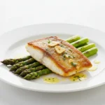 baked chilean sea bass with asparagus and garlic butter
