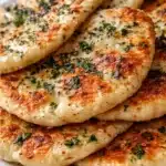 Soft and chewy 2-ingredient cottage cheese yogurt flatbread cooked in a skillet