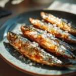 Assorted canned fish recipes on rustic table